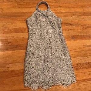 Grey shimmery lined dress with a silvery overlay